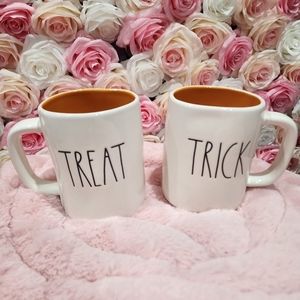Trick and treat rae dunn white and orange mugs